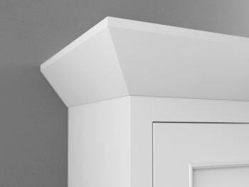 A close up corner of Craftsman Style Molding at the top of a kitchen cabinet from Dura Supreme Cabinetry.